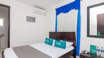 Ropa de cama hipoalergénica y tabla de planchar con plancha