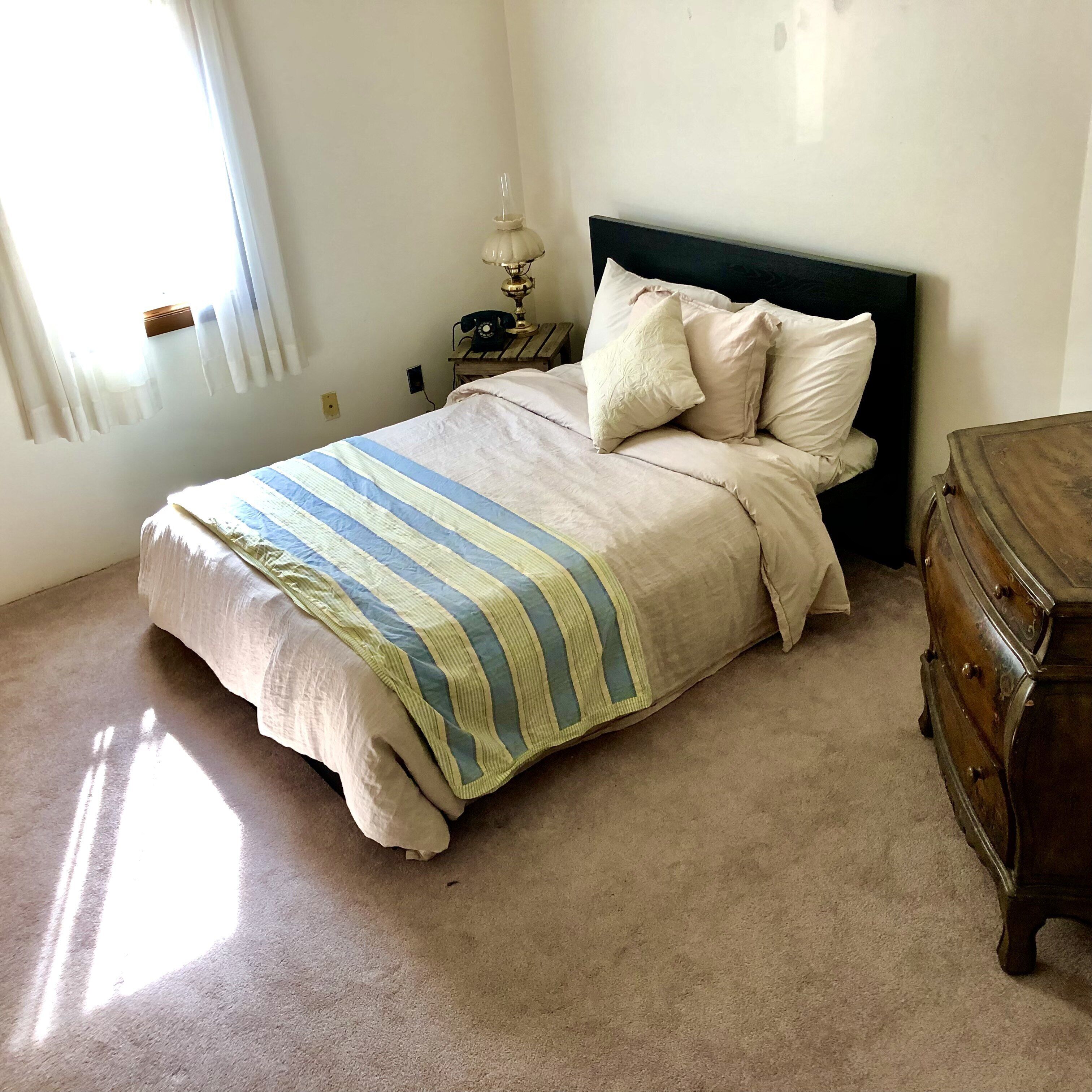 Steps away from the pristine sands and blue waters of Lake Michigan.