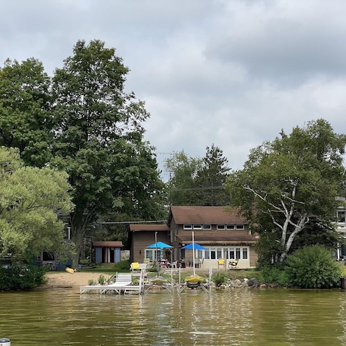 Every season home. Snow to summer's glow. A lakeside delight. Feels just right.