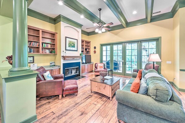 TV, fireplace, books
