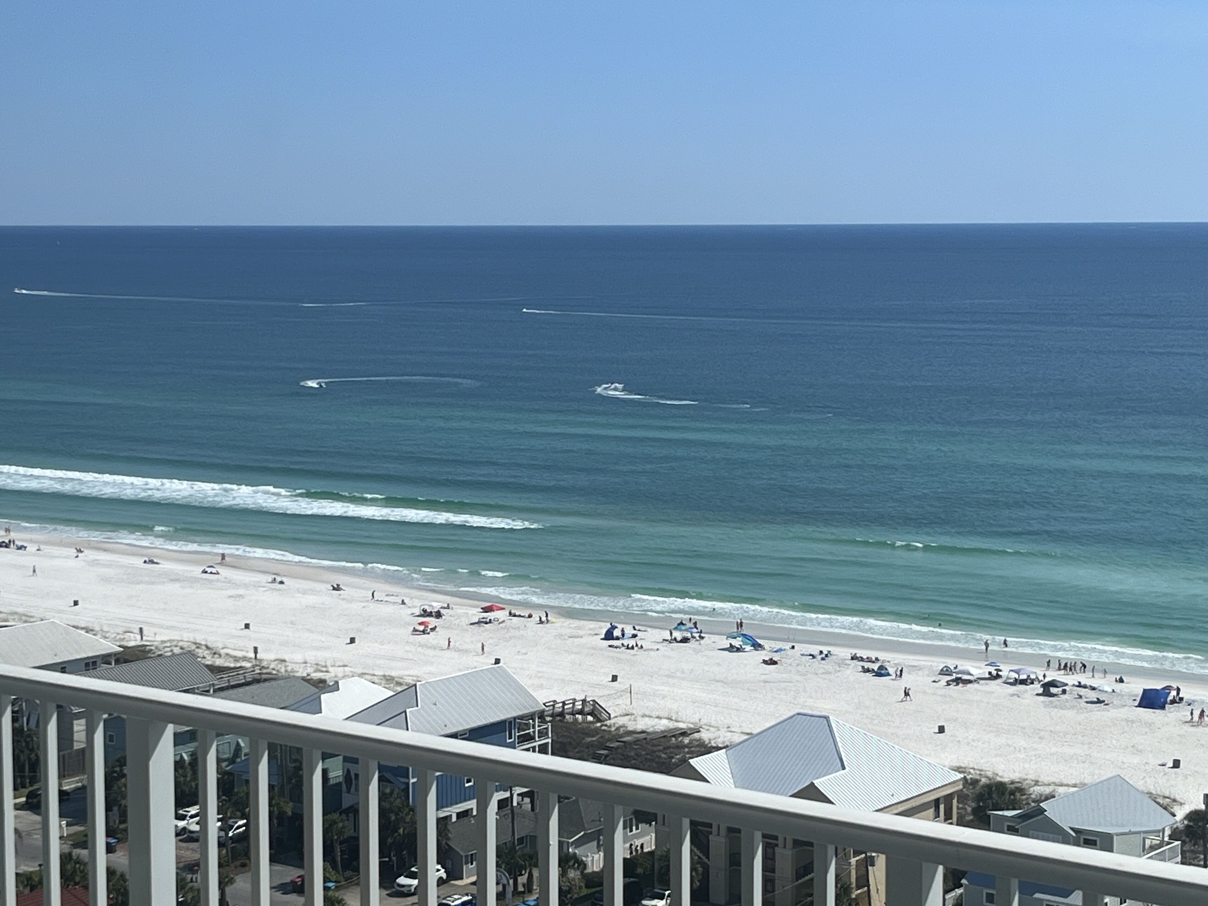 Never miss what's happening on the white sand beach with this oceanfront view