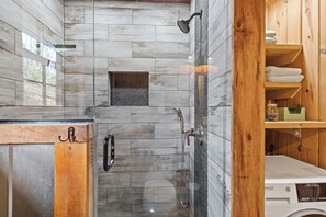 Shower, hair dryer, towels