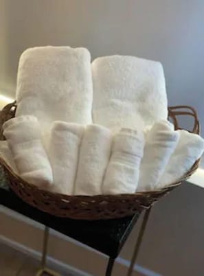 Shower, towels, toilet paper