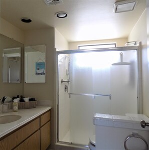 Shower, hair dryer, towels, soap