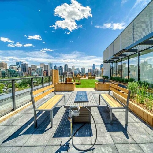 Upscale Industrial Condo with Patio near LRT