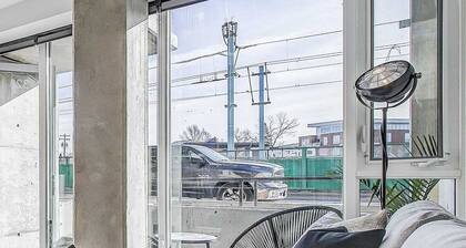Upscale Industrial Condo with Patio near LRT