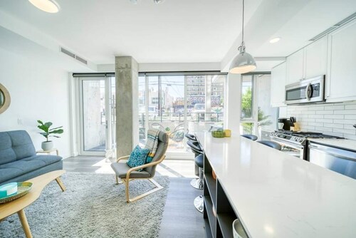 Bright & Beautiful Condo with Walkout Patio