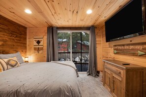 1 bedroom, desk, iron/ironing board, travel crib