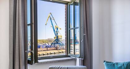 Great apartment in harbor location with balcony and free use of the sauna area