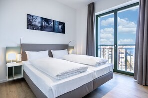 2 chambres, coffres-forts dans les chambres, Wi-Fi, draps fournis
