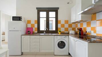Fridge, microwave, coffee/tea maker, toaster