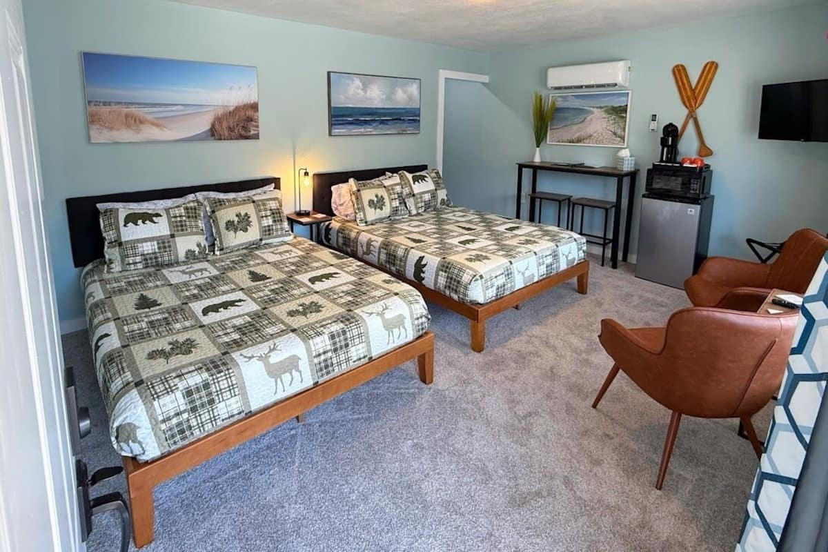 Familie suite | 2 slaapkamers, luxe beddengoed, bedden met traagschuimmatras