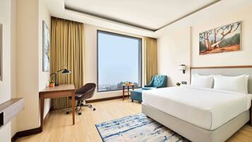 Premium bedding, memory foam beds, in-room safe, desk