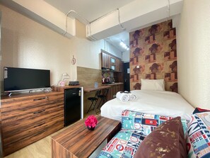 Room | 1 bedroom, free WiFi, bed sheets - Scandinavian Studio Room At Grand Asia Afrika Apartment (Bandung)