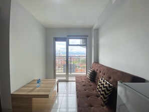 Room | Living room | TV - Bright And Relaxing 2Br At Mekarwangi Square Bandung (Bandung)