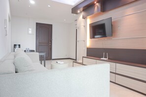 Room | Living room | TV - Comfort And Minimalist 3Br Apartment At Bellagio Residence (Jakarta)