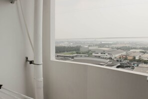View from property - Comfy And Tidy Studio At Riverview Jababeka Apartment (Cikarang)