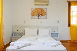 Standaard studio | Reisbedje, gratis wifi, beddengoed
