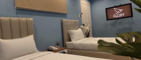 Habitación superior con 2 camas individuales | Wifi gratis y ropa de cama