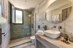 Shower, eco-friendly toiletries, hair dryer, towels