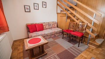 Apartment (Duplex 2 bedroom D) | Living room | 43-inch flat-screen TV with digital channels, TV