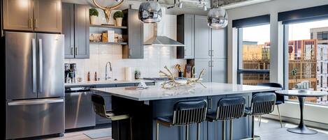 Condo, Multiple Beds, Balcony, City View | Private kitchen | Fridge, microwave, oven, stovetop