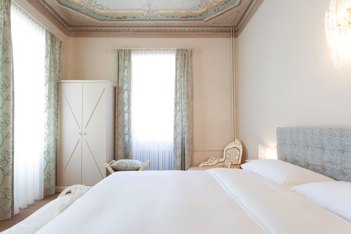 Superior Double Room | Down comforters, minibar, in-room safe, individually decorated