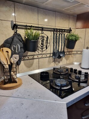 Apartment (A1) | Private kitchen | Fridge, microwave, stovetop, dishwasher - Apartments Neppa (Postira)