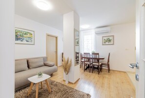 Apartamento (A1) | Sala de estar | TV de tela plana
