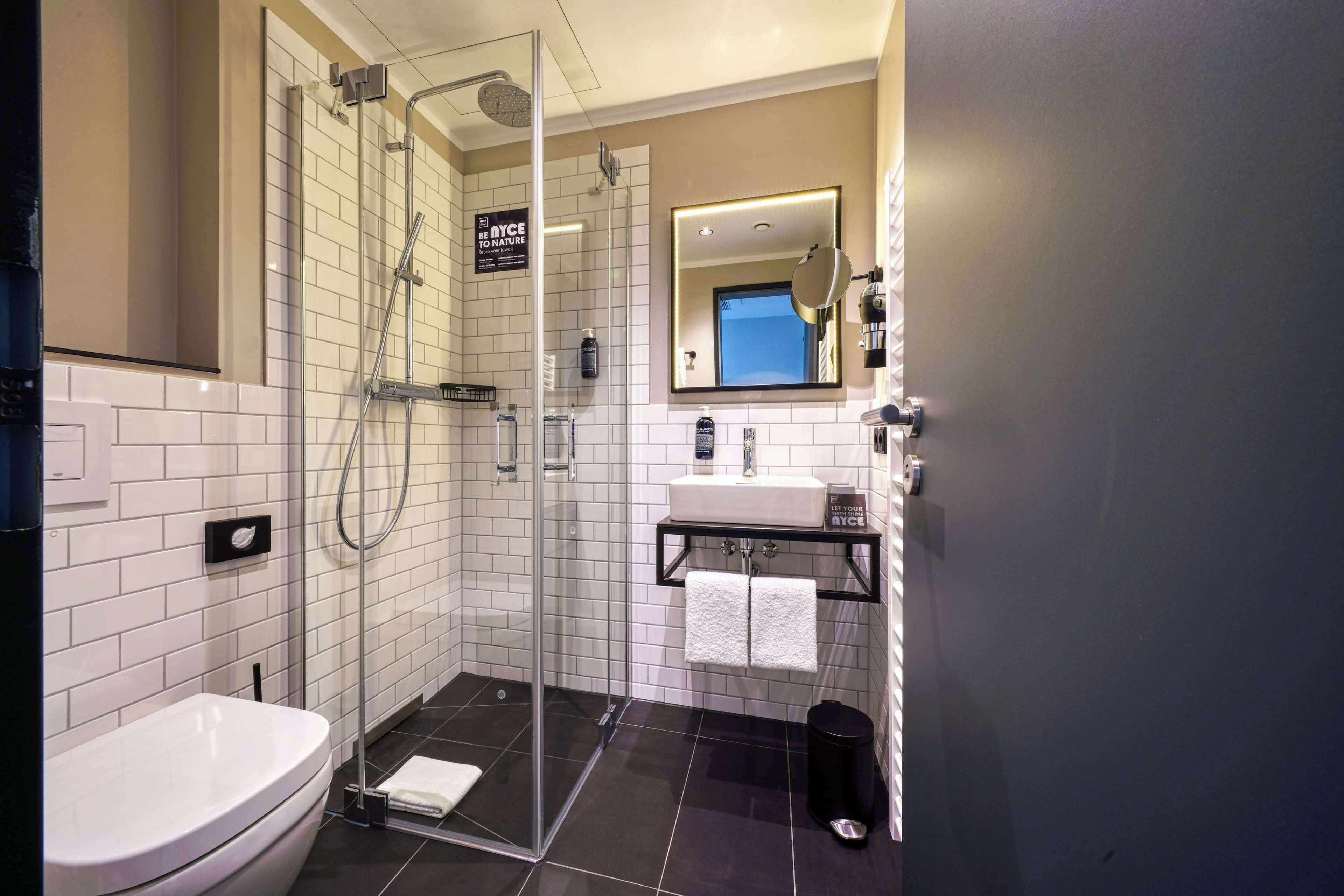 standard room, 1 double bed | bathroom | shower, rainfall showerhead, hair dryer, towels