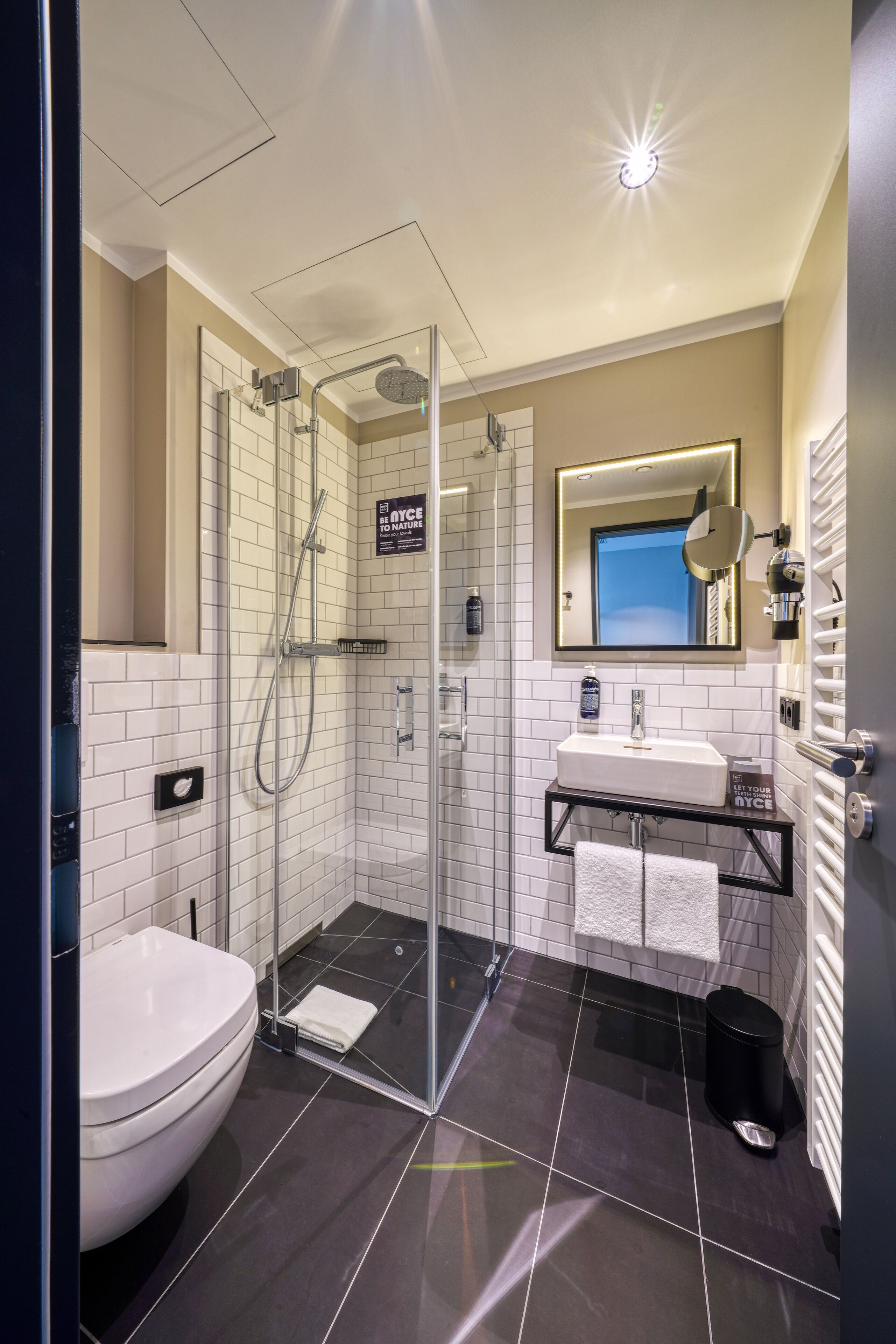 shower, rainfall showerhead, hair dryer, towels