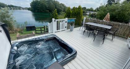 Luxury lakeside caravan situated on award winning park Tattershall Lakes,private Fishing Peg,Hot tub