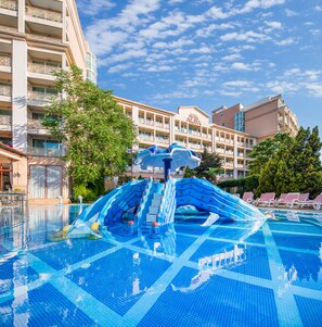 A hotel pool with a water slide, surrounded by a multi-story building with balconies. - Hotel Alba - All Inclusive (Sunny Beach)