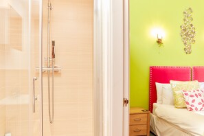 Bathtub, hair dryer, towels