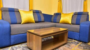 Apartemen, 1 kamar tidur | Area keluarga | Televisi 42-inci dengan saluran TV digital