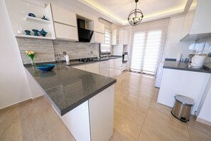 Fridge, microwave, oven, stovetop - Turquoise Shores Villa Oludeniz close to the Beach | 4br Family-Friendly Villa (Fehiye)