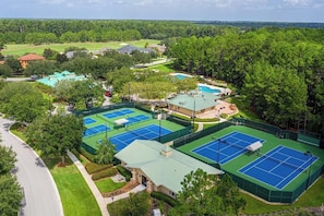 A tennis court complex with multiple courts, a pool, and surrounding greenery. - 6204-1 balcony-no carpet-full kitchen-W/D-cable-community pool & hot tub (St. Augustine)