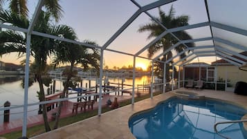 Outdoor pool, a heated pool, sun loungers