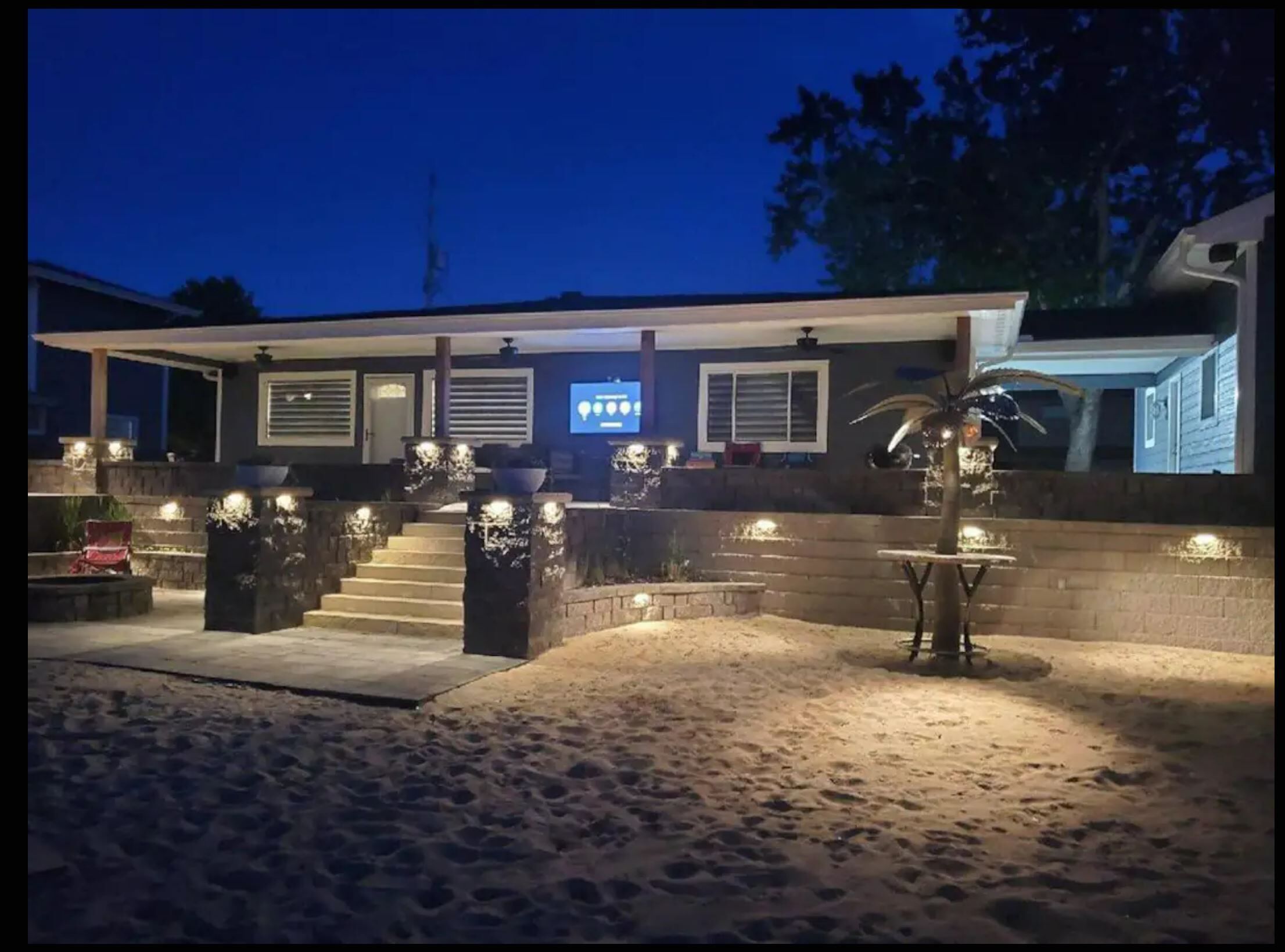 Newly remodeled Beachfront home on privately owned lake .