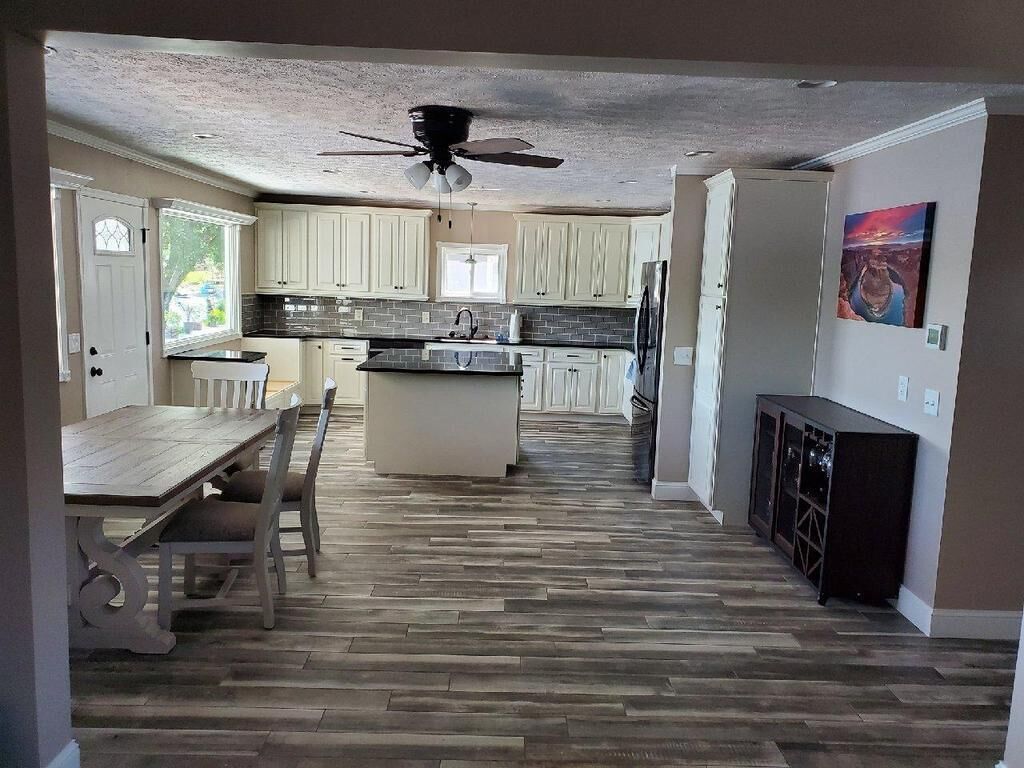 Newly remodeled Beachfront home on privately owned lake .