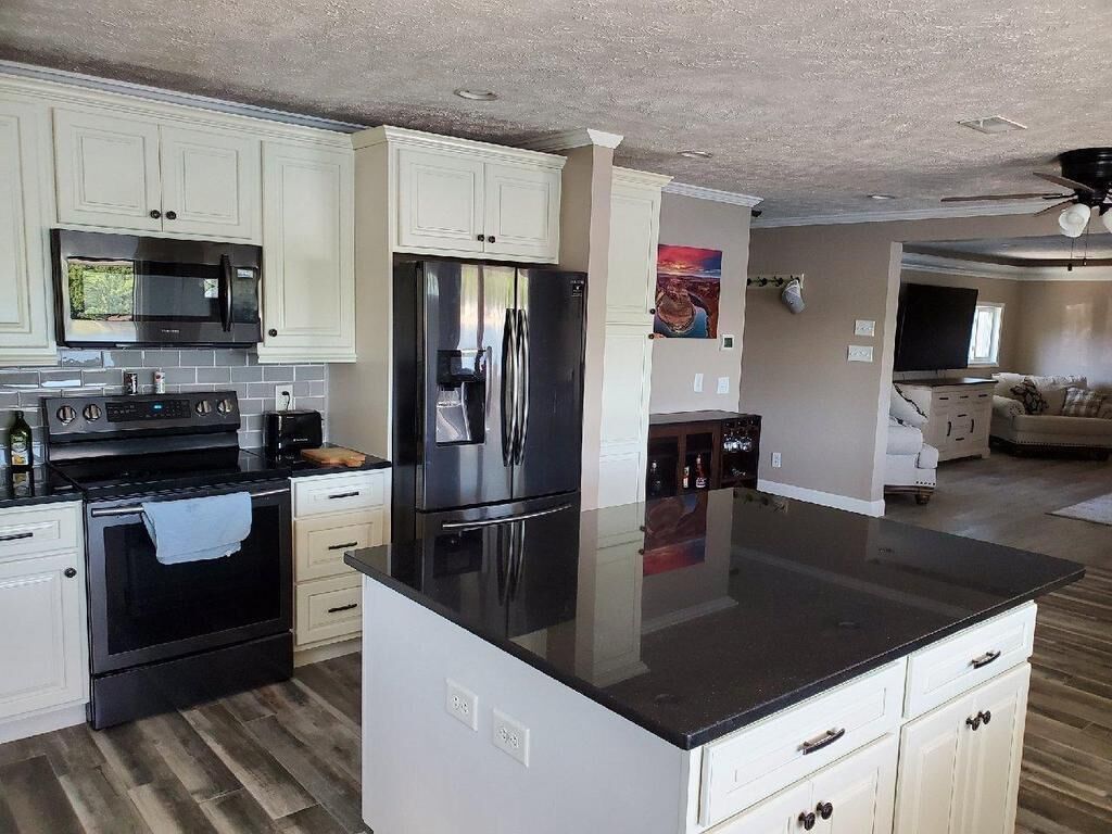 Newly remodeled Beachfront home on privately owned lake .