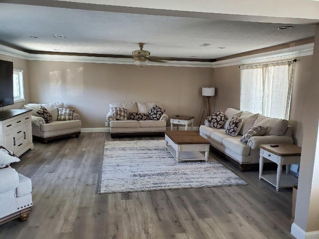 Newly remodeled Beachfront home on privately owned lake .