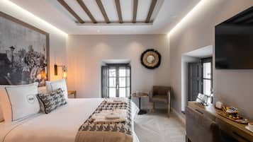 Habitación Deluxe | Minibar, caja fuerte, escritorio y sistema de insonorización