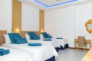 Quarto família | Roupas de cama premium, edredons de pluma, camas com colchões pillow-top