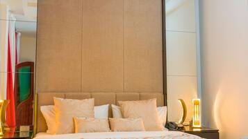 Premium bedding, down duvets, pillow-top beds, in-room safe