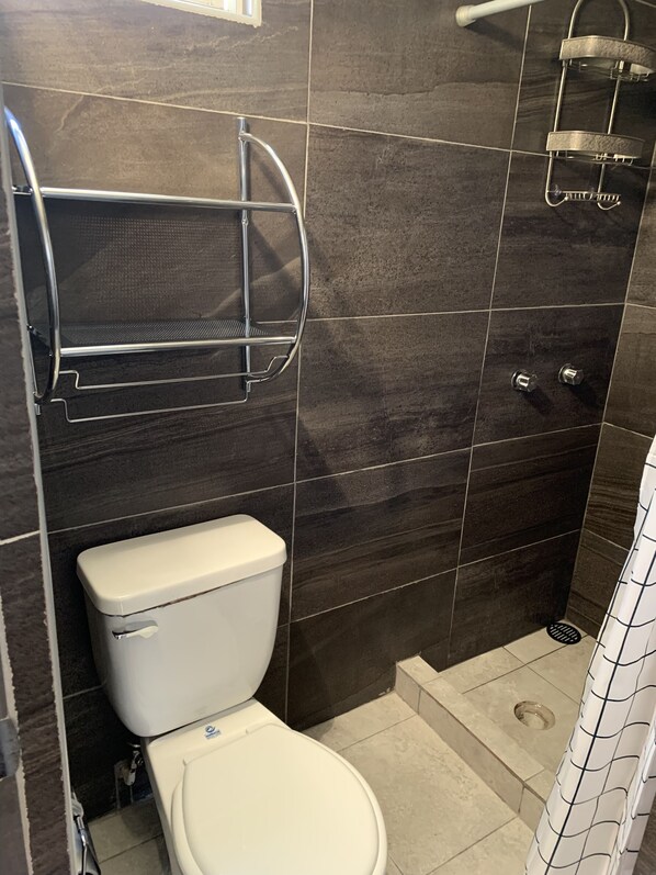 Shower, towels, soap, shampoo