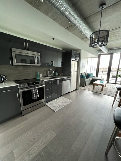 2 bed downtown across jets arena king bed wifi 