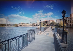 Stroll along the waterfront promenade with a serene view of the river.
