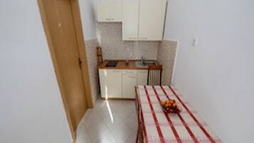 Fridge, toaster, cookware/dishes/utensils