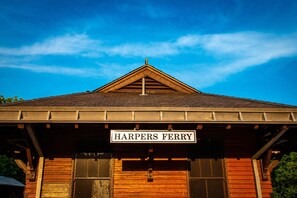 Stunning Harpers Ferry building with a gabled roof and wooden siding.